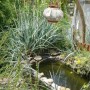 Ogród, Ogrodowe dekoracje - zbiornik na deszczówkę - czyli wanna w obudowie