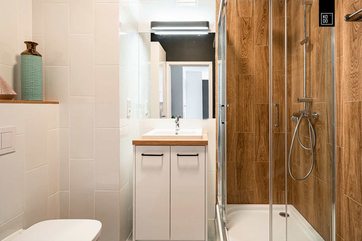 Domy i mieszkania, Apartament ETNO - Motyw drewna jest częścią wspólną całego domu. Wystąpił nawet w łazience – w postaci modnych i praktycznych płytek pod prysznicem.

fot. KODO Projekty i Realizacje Wnętrz